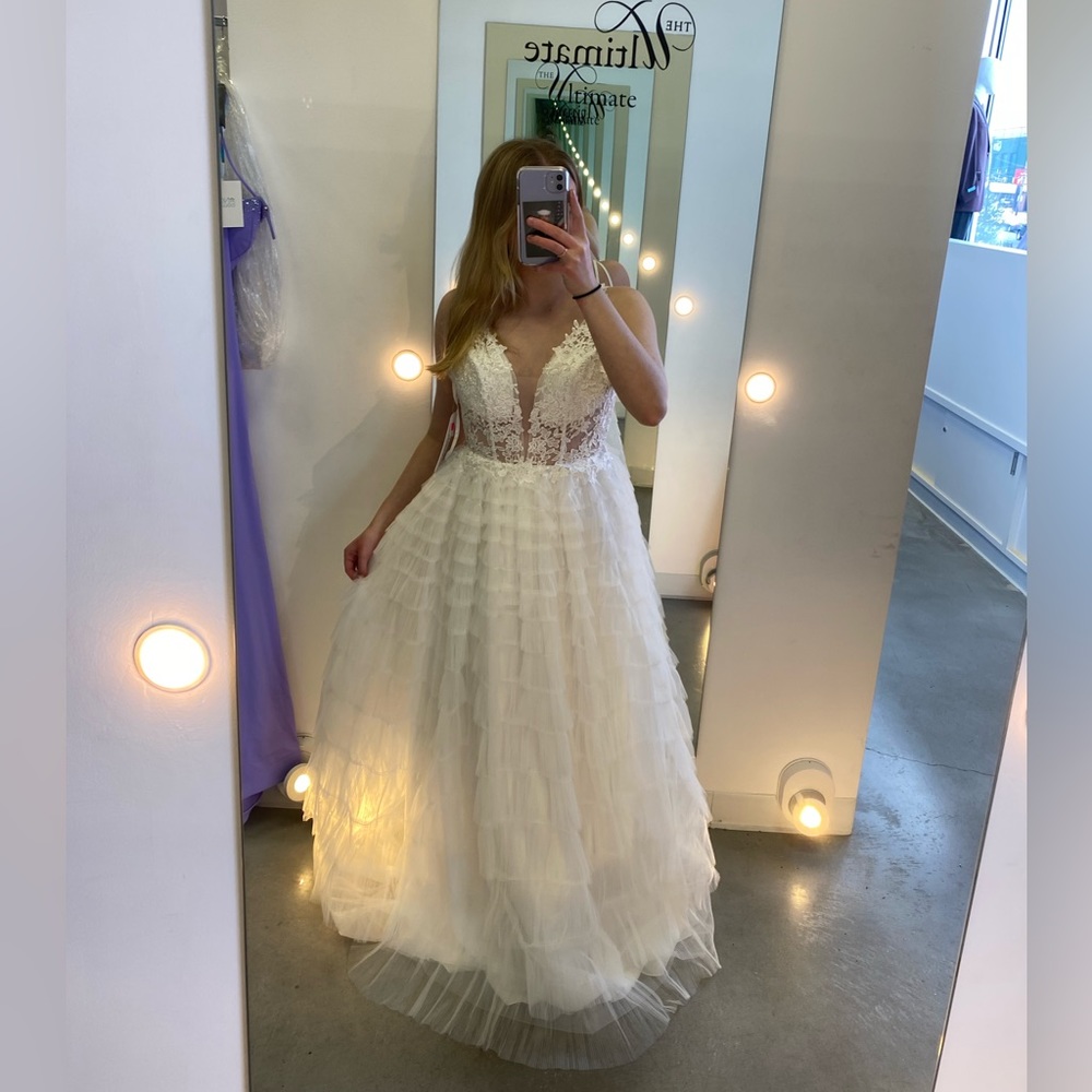 Nina Canacci #3226 Ivory dress. Size 4. Asking $375. Bought for $600.